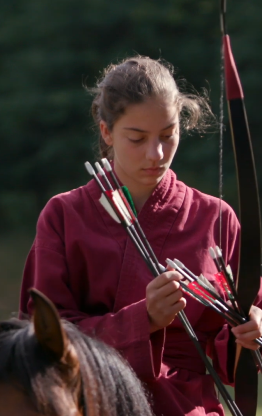girl choosing arrow